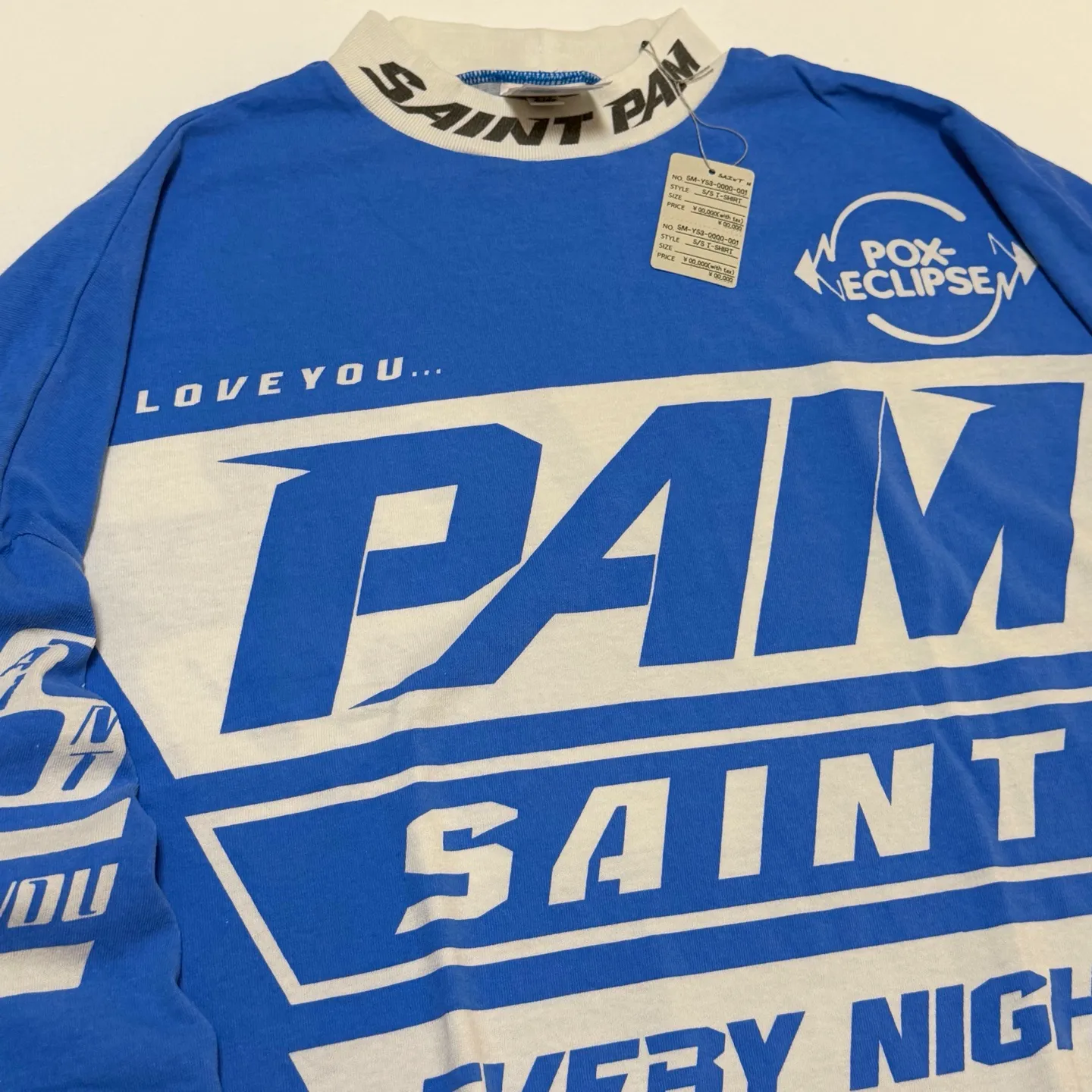 SAINT Mxxxxx Make the printing look distressed and white. Correct accessories. Customized co-branded model with P.A.M. wash mark.